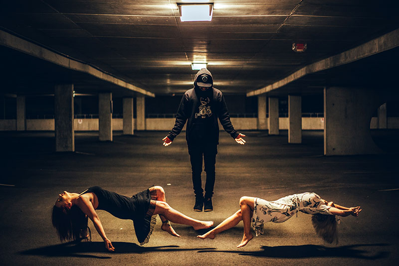 Magician levitating three people
